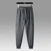 Calças masculinas de fitness treino marca calças outono inverno masculino algodão calças esportivas joggers sweatpants homens casuais calças magras tamanho asiático M-5XL