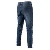 Mäns jeans män bomull stretchig blå 2024 avslappnad fast färg mitt midja denim byxor vår högkvalitativ blixtlås jean för män