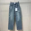 Damenjeans Jeans Designer eingetroffen Taille ausgehöhlt Patch Dekoration Blue Denim Marke Warm Loewee Purpl Hig 240304