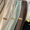 Kvinnors byxor koreanska casual pendling hög midja fast färg bred ben kvinnliga vår mode raka byxor kläder y2k sommar