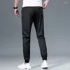 Pantalons pour hommes 2024 Printemps Été Jogger Hommes Mode Cordon Casual Tricoté Tissu Fileté Pied Mince Pantalon Mâle Marque