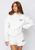 2024 White Hoodie Womens Designer Abbigliamento Spring Autumn Inverno Nuovo set alla moda Sporty Long Pullover Pullover Joggers Traccetta