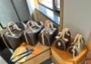 24SS Herr- och kvinnors universella lyxdesigner Cowhide Leather Checkerboard Pill Bag Women's Handväska axelväska Crossbody Purse Bronze Hardware 25cm