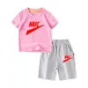 Jongens en meisjes nieuwe zomersportkleding kindermerk bedrukt casual T-shirt met korte mouwen en ronde hals, kinderkleding