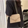 Bolsos de lujo de diseñador 2023, bolsos de cuero Pu de calidad, cadena de mensajero Popular para mujer, bolsos de hombro para mujer a la moda