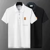 T-shirts Designer Polo pour hommes Polos pour hommes Mode T-shirt en coton Top haut de gamme T-shirt poitrine Badge Luxe Vêtements de sport taille M-3XL 240304