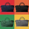 Duffel Bags Kadın Çanta Erkekler En Yüksek Kaliteli Moda Duffel Çantalar Omuz Kayışları ile Luxurys Tasarımcıları A2 48*23*26cm