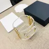 European And American Exaggerated And Atmospheric Wide Edition High-quality Light Luxury Buckle Pearl Women's Double Letter Resin Bracelet