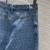 Jeans da donna Jeans di marca Pantaloni dritti in denim a vita alta con punti ondulati Tessuto importato Pantaloni stile retrò con taglio irregolare Abiti jeans firmati 240304