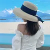 ymsaid women's Sun Summer Beach Straw women boater Hat with libbon tie for Vacation holiday holidy audrey hepburn y200602261q