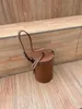 10A new products launched, charming design, classic bucket bag style, mobile phone bag, lipstick bag, cow leather handle, printed micro label, gold hardware Designer bag