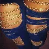 Kvinnors jeans mörkblå denim jeans sommar vårhål kedjor design långa byxor hiphop street byxor 240304