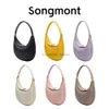 Songmont Crescent mezza luna Luna Designer Borsa per la manica della moda femminile Mens Brassa da viaggio a assi