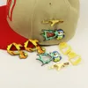 Vendita all'ingrosso Pin Cappelli Baseball Calcio Pallacanestro Cappello Pin Moda Retro Decorazione Cartoon Pin Cottura Vernice Smalto creativo