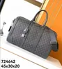 10A Qualité miroir Marque de luxe Keepall Sac de voyage Hommes Femmes Sac à main G Designer Sac Duffel Gris Cuir de vachette véritable Grand sac Sacs à bandoulière de mode 724642