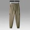 Calças masculinas de fitness treino marca calças outono inverno masculino algodão calças esportivas joggers sweatpants homens casuais calças magras tamanho asiático M-5XL