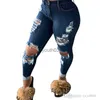 Jeans da donna Jeans alla moda Leggings in denim lavato con foro rotto Pantaloni lunghi primaverili Taglie forti 240304