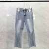 Jeans Designer donna Jeans strappati effetto consumato Biker Slim Fit Denim Jeans da uomo Patch traforata Piedi larghi Micro Flare Jeans 240304