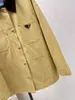 Shenzhen Nanyou 23 Autumn/Winter Fashion Letter Triangle Light Core Fleece Flip Collar Outline Medium Length Jacket Coat for Women