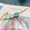 68% KORTING horloge Horloge Nieuwe Xiangjia Lichte Luxe Jade Armband met Gans Eivormige wijzerplaat Kleine en delicate Hand Decoratieve Quartz Dameseditie