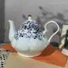 Filiżanki spodki retro niebiesko -biała porcelanowa kawa herbata herbata stołowa ceramiczne popołudniowe przybory picia kompletne stoliki