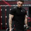 Men T Shirts Fashion Summer Bodybuilding Letter Printed Tshirt Men GYM Fitness Workout O-Neck Show Muscle 240304