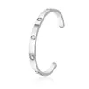 carter Live Vendita calda Bracciale per coppia in acciaio al titanio Set semplice ed elegante con bracciale in acciaio al titanio a forma di C con diamante Bracciale in acciaio inossidabile per donna