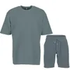 Costume rayé pour hommes, ample, col rond, t-shirt et short à manches courtes, couleur unie, sport décontracté, ensemble deux pièces, été 2023, 240301