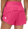 Womens Yoga Lu Shorts Abiti con esercizio fisico indossano pantaloni corti ragazze che gestiscono tasche di abbigliamento sportivo elastico con tasca sportiva fodera di velocità fodera