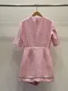 Franse jurk lichte luxe ingelegd met strass steentjes grove tweed jumpsuit met korte mouwen en rechte buis
