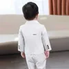 Costumes enfants Blanc Mariage Suit Prince Kids Jacket Pants Photographie Suit Fleur Boys Robe Tuxedo Robe bébé 1 an Robe d'anniversaire Costume