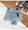 Jeans da donna Ksubi Jerans Pantaloncini di jeans Azzurri a vita alta larghi e sottili con fori e nappe Pantaloni caldi sexy estivi 240304