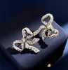 Mignon diamant perle sculpté ruban arc oreille Stud femmes fête boucle d'oreille accessoires cadeau d'anniversaire boucles d'oreilles avec sac à poussière original boîte bijoux approvisionnement