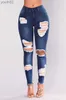 Jeans femininos celebridade estrangeira magro ajuste com buracos exportação borlas pé boca calças comércio on-line 240304