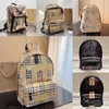 Homens de mochila e mulheres de alta qualidade Travels Metal Metal Acessórios de metal vintage Backpack de bolsa escolar de duas vias