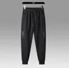 Calças masculinas de fitness treino marca calças outono inverno masculino algodão calças esportivas joggers sweatpants homens casuais calças magras tamanho asiático M-5XL