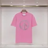 رجال تي قمصان مصممة قمصان المحملات الوردي ملابس النساء غير الرسمية قصيرة الأكمام في الهواء الطلق طاقم رقبة رقبة قميص أزياء شارع معطف الشارع