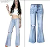 Kvinnors jeans grossistkvinnor jeans Loose Ripped Hole Tassel Pocket Button Wide Leg Pants Luxury Fashion Punk Blue Jeans For Woman Good Quality 240304