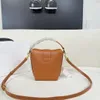 High-end 5A spring and summer new products, charming design, classic small bucket bag style, mobile phone bag, lipstick bag, gold hardware designer bag, classic crossbody