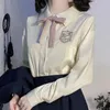 Camicette da donna Camicia uniforme JK per ragazze della scuola giapponese Ricamo Top da donna Autunno stile college Manica lunga Abbigliamento con fiocco carino