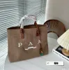 Klasyczna damska torba na płótnie luksusowe nylonowe lniane sprzęgło do makijażu torby na zakupy męskie Raffias projektant torby na bicie duże torebki torby na plażę 41*32 cm A1