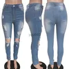 Jeans da donna Jeans alla moda Leggings in denim lavato con foro rotto Pantaloni lunghi primaverili Taglie forti 240304