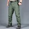 Men taktyczne spodnie wielokrotne kieszeń elastyczność kieszonkowa wojskowa miejskie spodnie Mężczyźni Wodoodporne spodni ładunkowy 6xl 240304