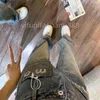 Women's Jeans miui luxury Jeans jeans female pants bell bottom pants denim pants waist fashion Blue slacks trousers design sweatpants 240304