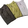 Îles nouveaux shorts pour hommes et femmes, été mince sport décontracté plage ample imperméable cinq divisions pantalon 513