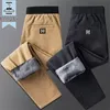 Automne et hiver mode tendance pantalons en velours côtelé hommes décontracté ample confortable épais chaud grande taille pantalons de haute qualité 240227