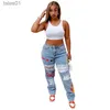 Jeans da donna Jeans Designer Moda Lusso Qualità S Jeans Cuore Denim Cut-Out Distressed Baddie Abbigliamento Streetwear Pantaloni larghi in vita Blu 240304