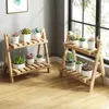 Andra trädgårdsbyggnader flernivåhyllor Plant Pot Stand Modern Home Decoration Möbler Flower Shelf Simple Solid Wood Plant Display Shelf YQ240304