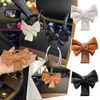 مقعد جديد خلفي Bowknot تخزين الخطاف PU حقيبة الأزياء حقيبة الأزياء محفظة Universal Clips Auto Clips for Car Accessori W9J0