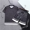 Diseñador para hombre Chándales Cartas de moda Trajes estampados Chándales Mujer Jersey Traje deportivo Pista informal Ropa deportiva Camisetas Mayoristas Trajes de manga corta